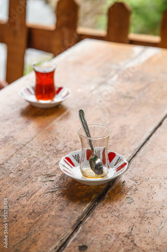 Photography turkish tea glasses on a table