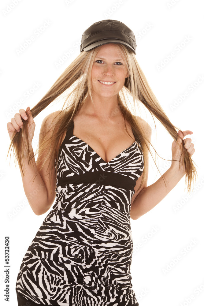 woman zebra dress black hat hold hair