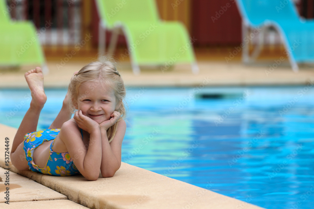 girl  near the open-air swimming pool
