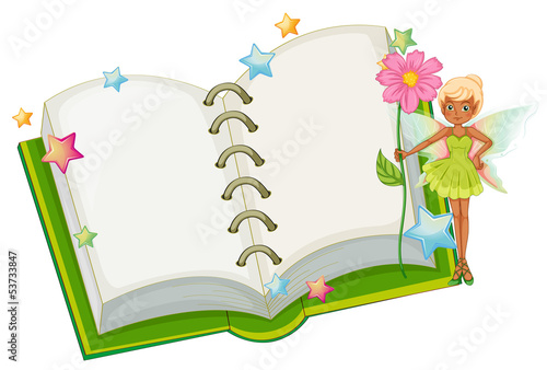 An open book with a fairy holding a pink flower