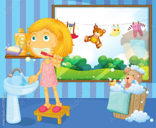 A girl brushing her teeth