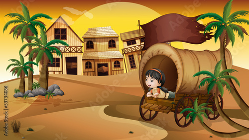 A young girl inside a wagon