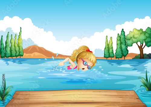 A girl swimming in the river