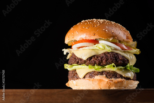 big burger isolated on black