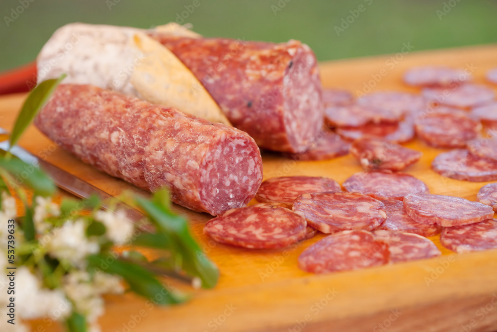 chopping board of salami of sliced chopping board of salami of sliced