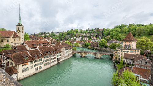 Church, bridge and houses with tiled rooftops, Bern