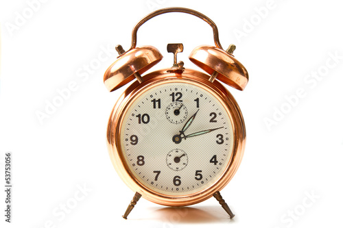  old style alarm clock isolated on white