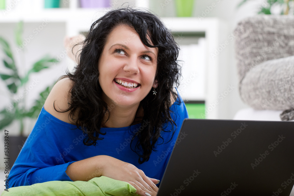 portrait of beautiful young girl at home with notebook portrait of beautiful young girl at home with notebook