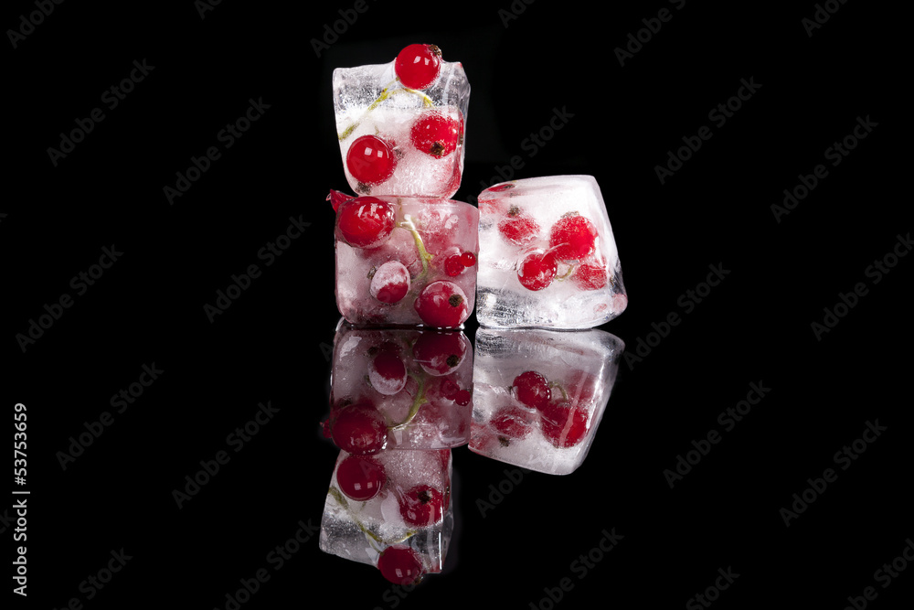 Redcurrant frozen in ice cubes. Redcurrant frozen in ice cubes.