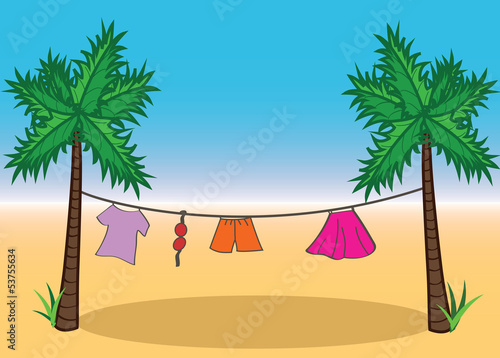 Summer beach palm trees with clothes