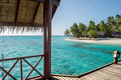 Fototapeta Naklejka Na Ścianę i Meble -  Jetty to a tropical beach