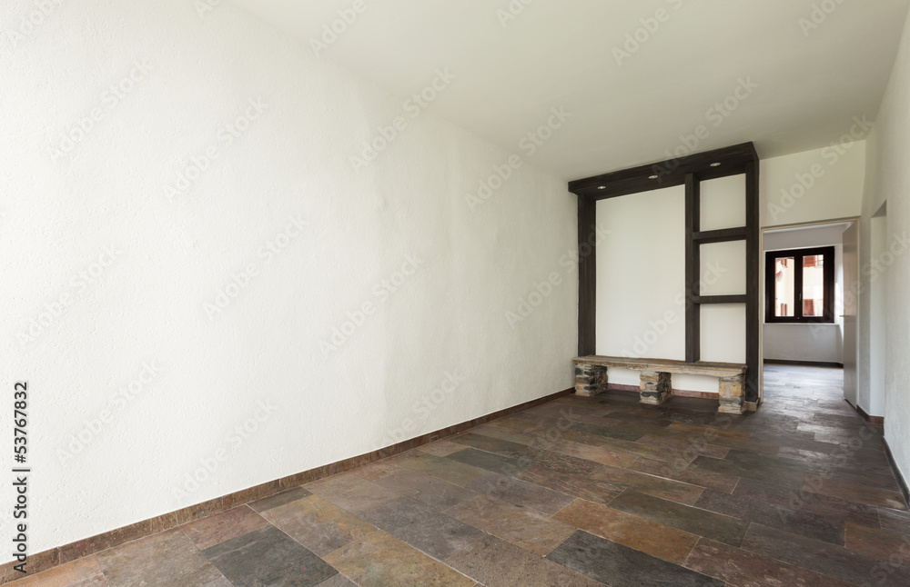 Obraz premium interior old house, empty room with stone floor