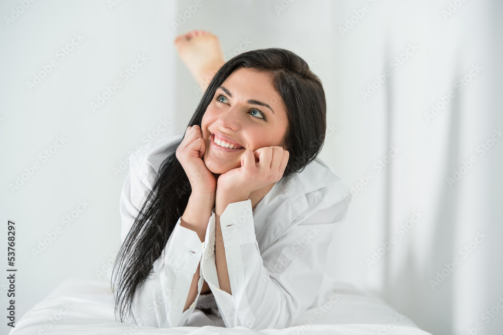 Carefree and confident in herself wearing man's shirt Carefree and confident in herself wearing man's shirt