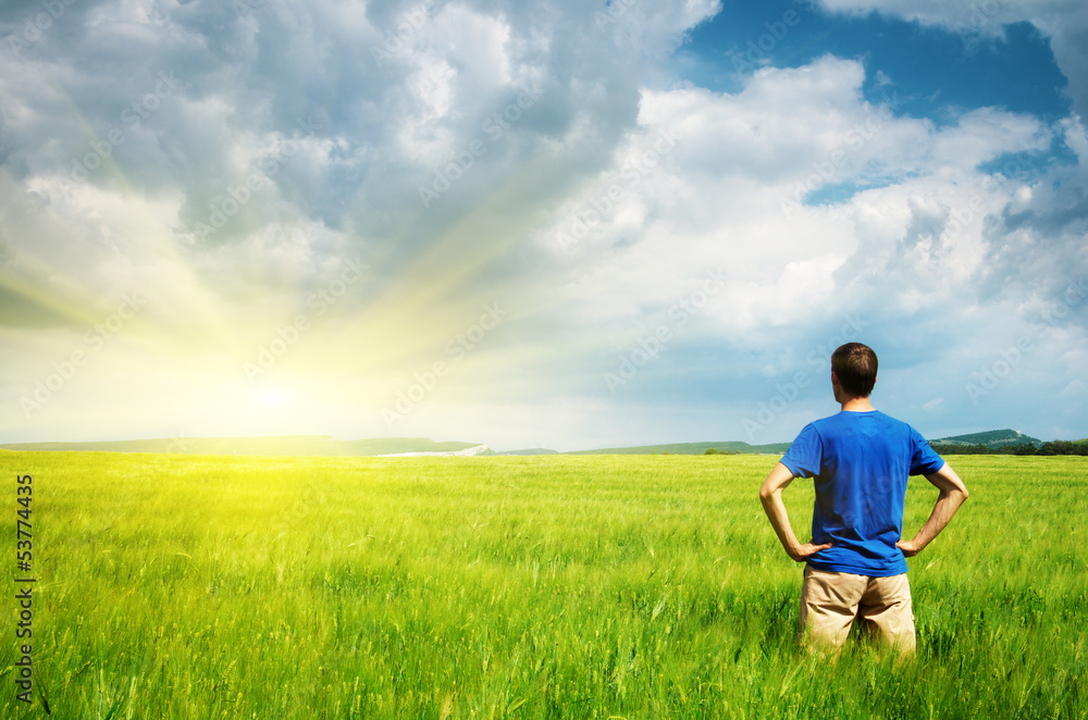 Man in meadow green meadow.