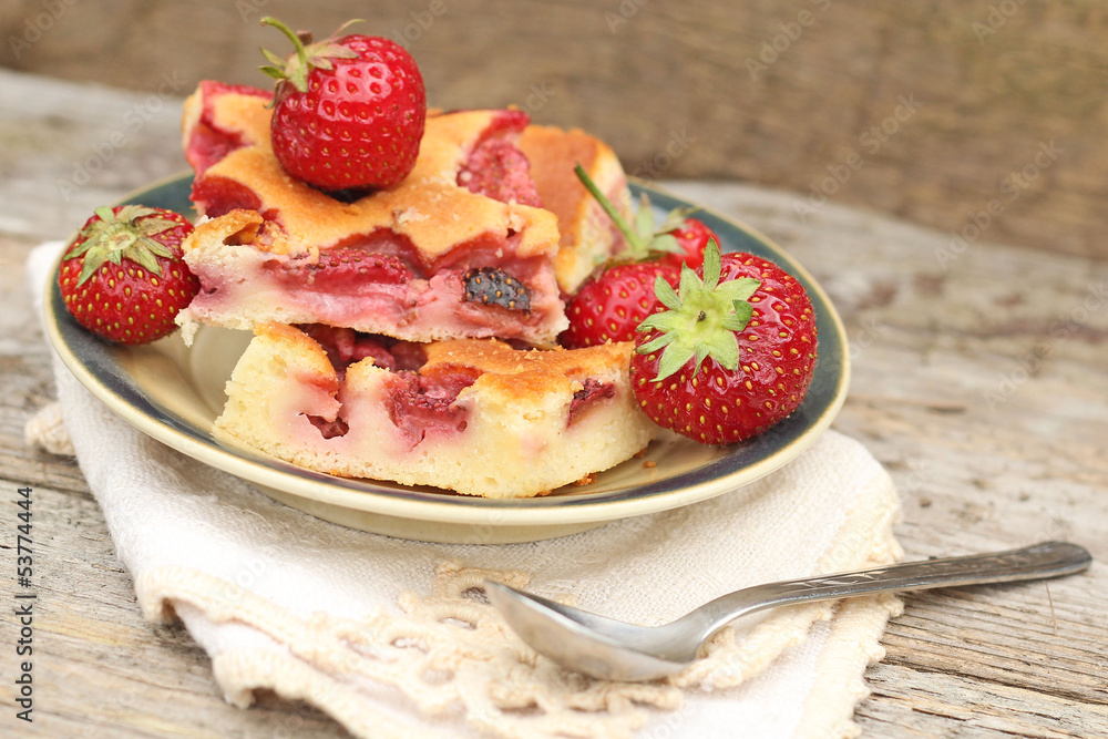 Fresh baked Strawberry Cake on wooden background Fresh baked Strawberry Cake on wooden background