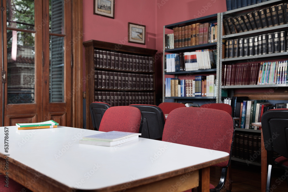 Chairs At Table With Bookshelf In Library Chairs At Table With Bookshelf In Library