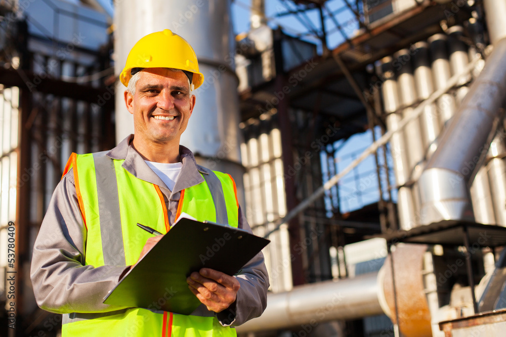 happy middle aged oil industry worker happy middle aged oil industry worker
