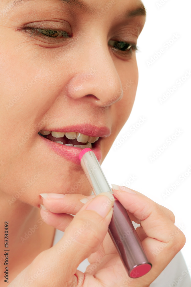 Middle age asian woman with a lipstick Middle age asian woman with a lipstick