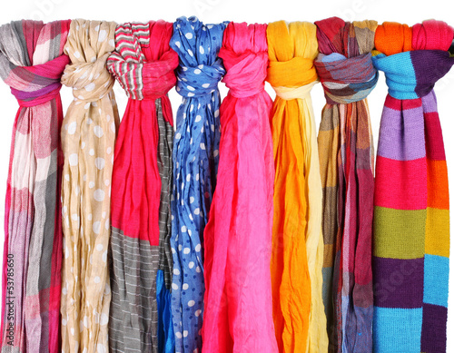 Many bright female scarfs isolated on white © Africa Studio