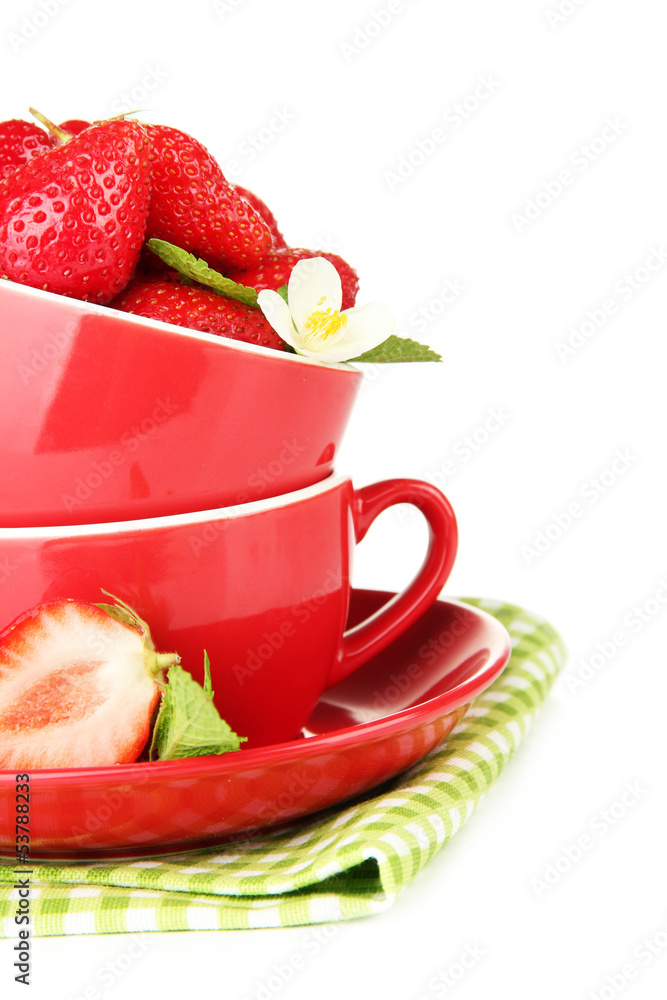 Ripe sweet strawberries in red cups, isolated on white Ripe sweet strawberries in red cups, isolated on white