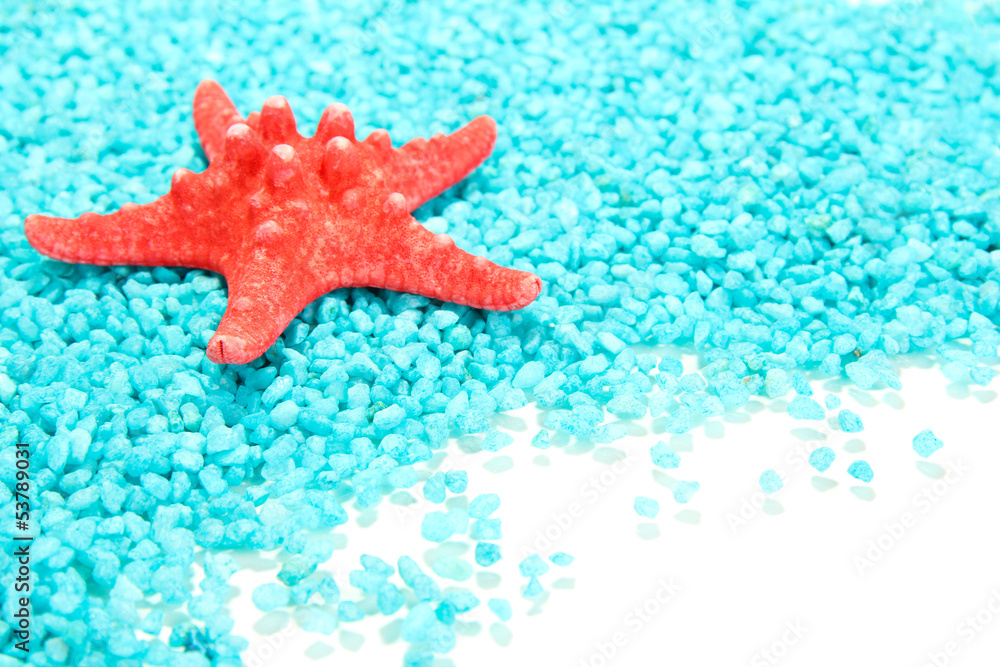 Starfish on blue crystals of sea salt background Starfish on blue crystals of sea salt background
