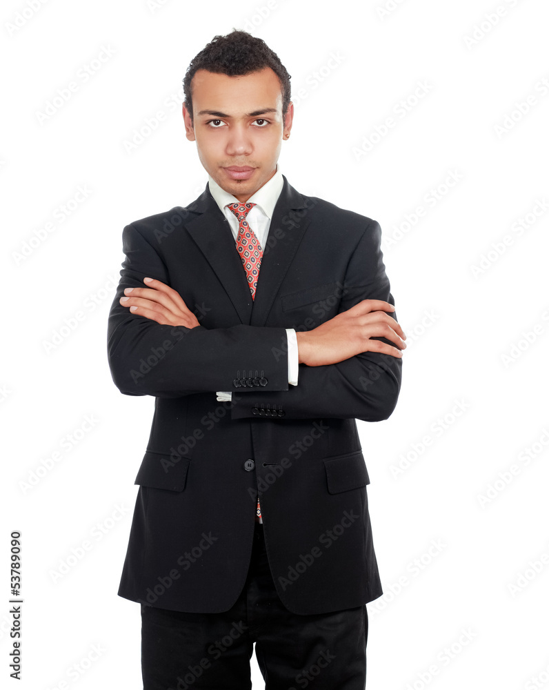 Handsome young business man standing with folded arms Handsome young business man standing with folded arms