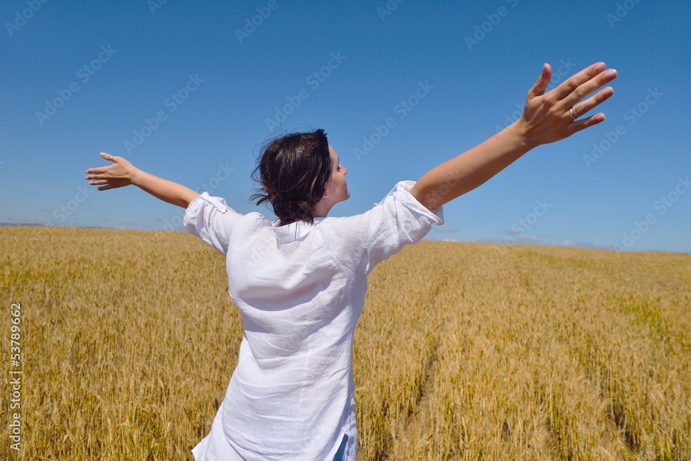young woman with spreading arms to sky young woman with spreading arms to sky
