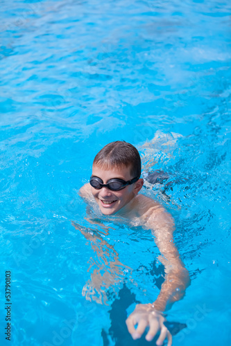 boy swimming in the pool