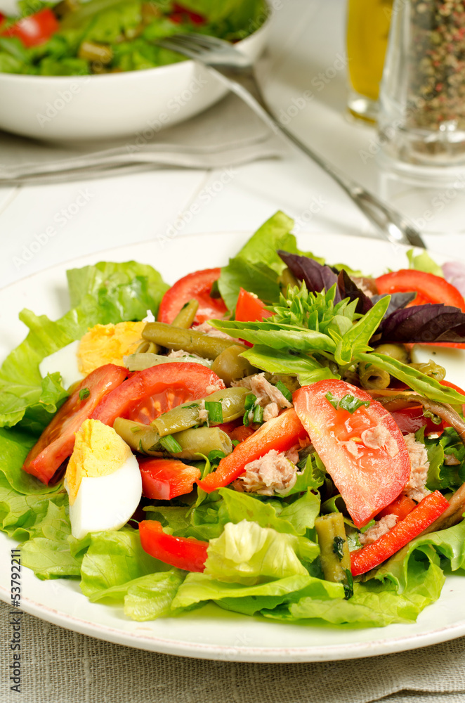 Salad  with tomatoes, green beans, tuna, eggs and anchovies