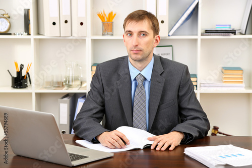 Young businessman in office...