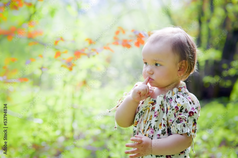 Portrait of little girl in a spring forest Portrait of little girl in a spring forest