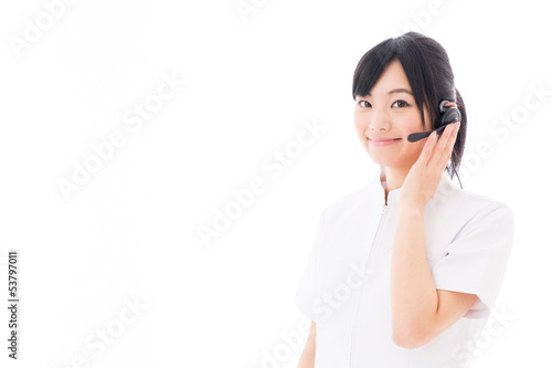 attractive asian nurse with headset 