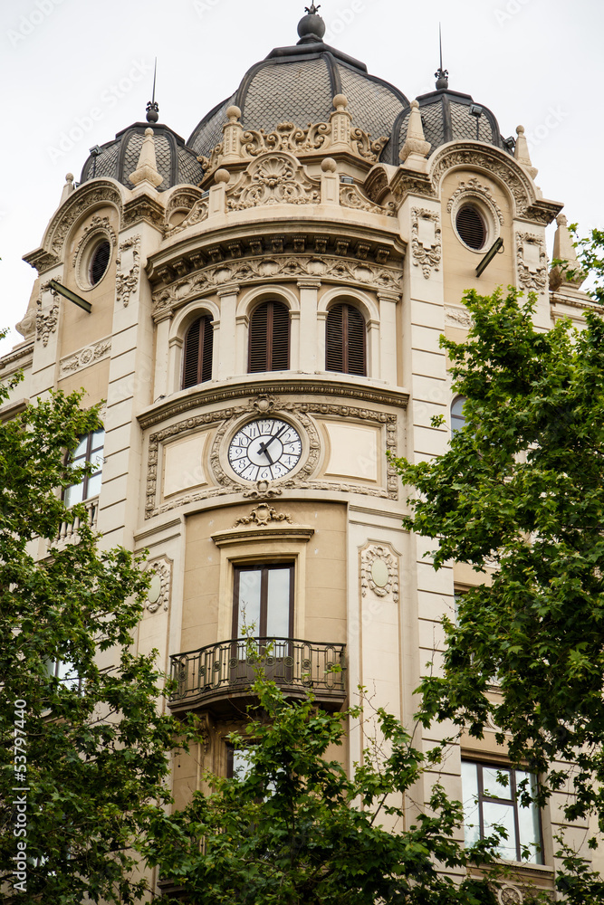 Clock on Old Domed Building in Barcelona