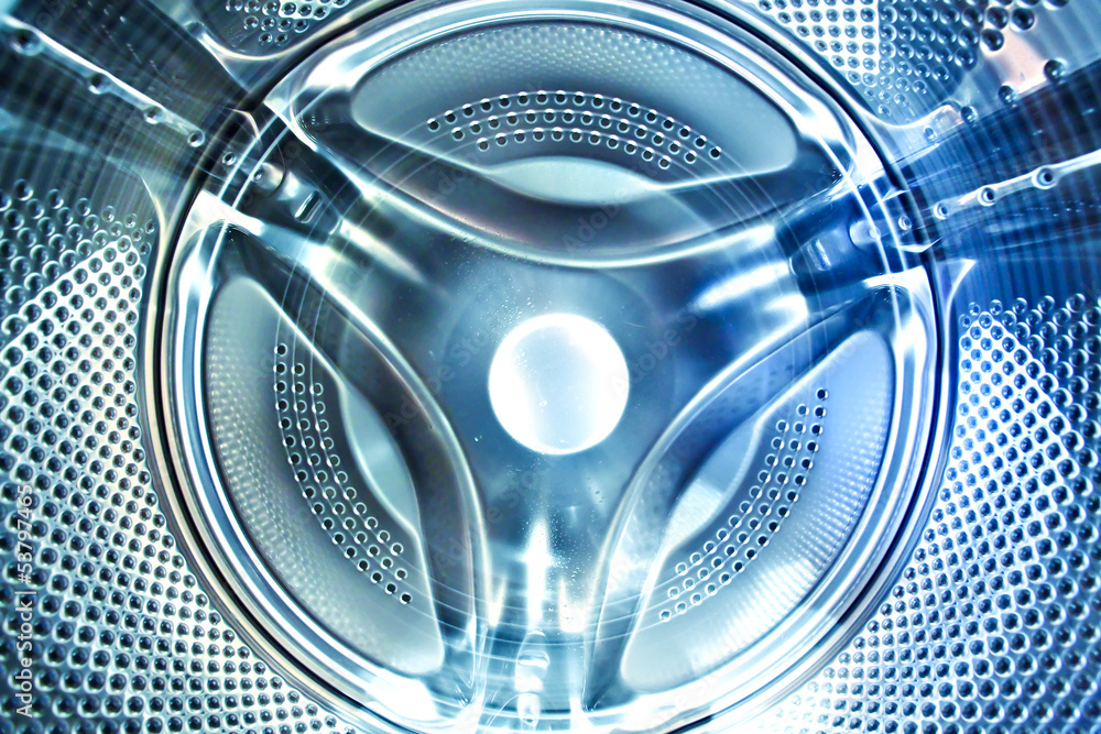 inside view into blue washing machine drum moving inside view into blue washing machine drum moving