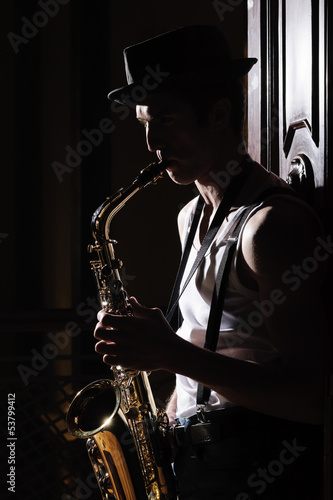 Photography Music in his soul. Black and white shot of men playing saxophone