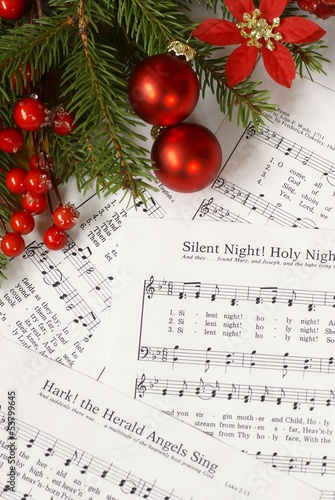 Fotografie Sheets of Christmas carols. Focus on decorations