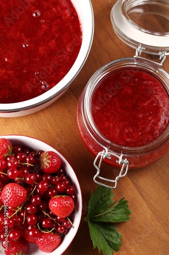 Strawberry jam and berry fruits