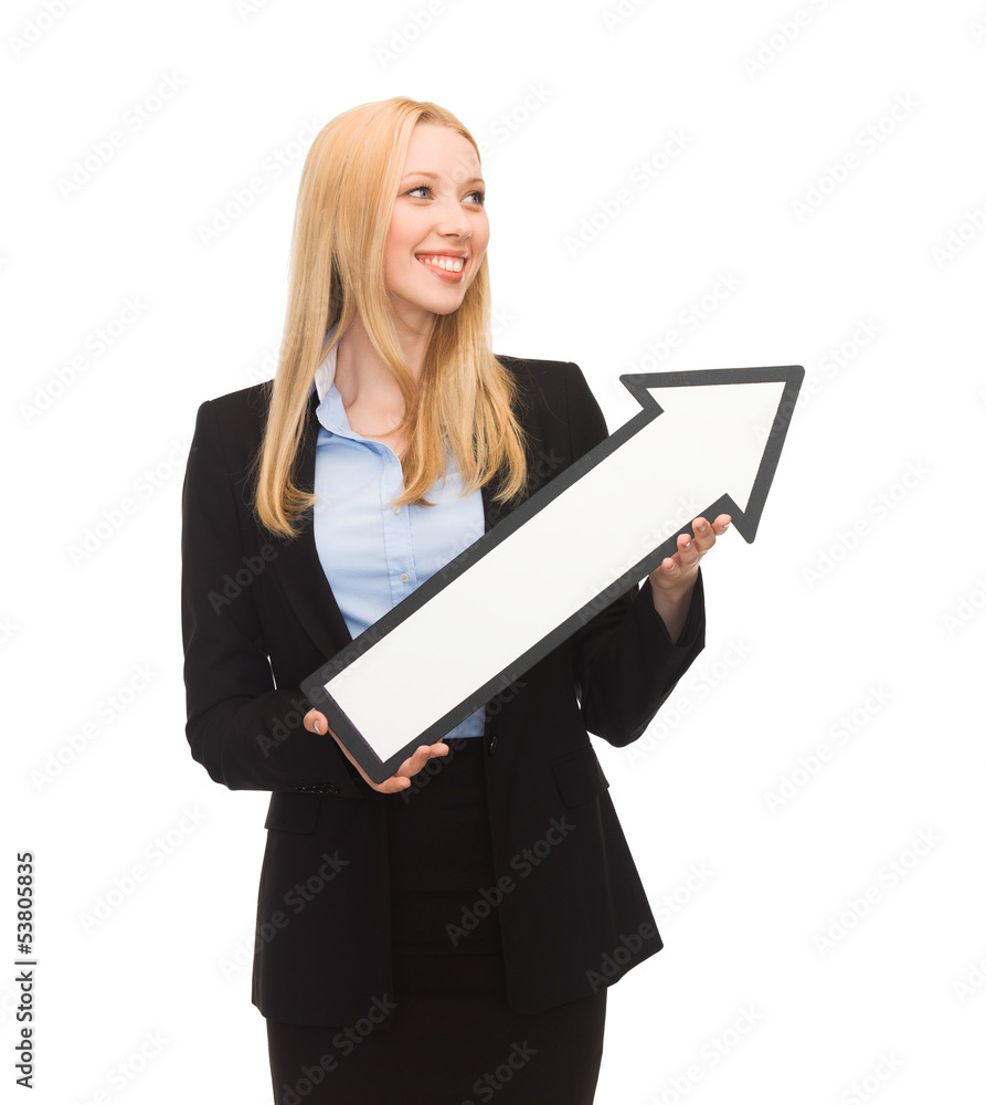 smiling businesswoman with direction arrow sign smiling businesswoman with direction arrow sign