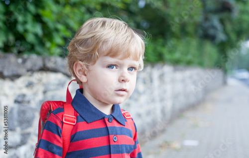 Little toddler boy on way to kindergarten
