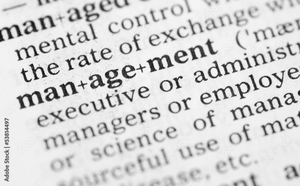 Macro image of dictionary definition of management