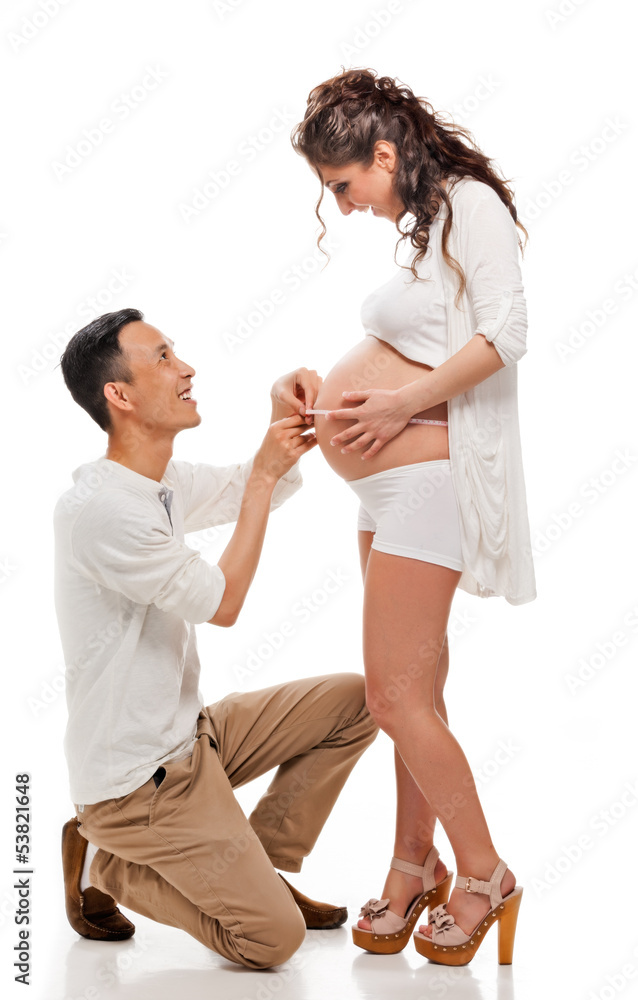 Pregnant woman with her husband.
