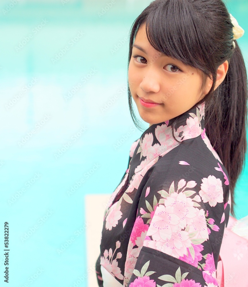 Pretty girl wearing Japanese kimono Pretty girl wearing Japanese kimono