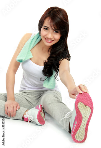 young sport woman stretching