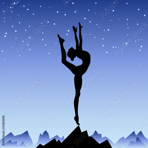 Beautiful flexible girl gymnast staying on one leg.