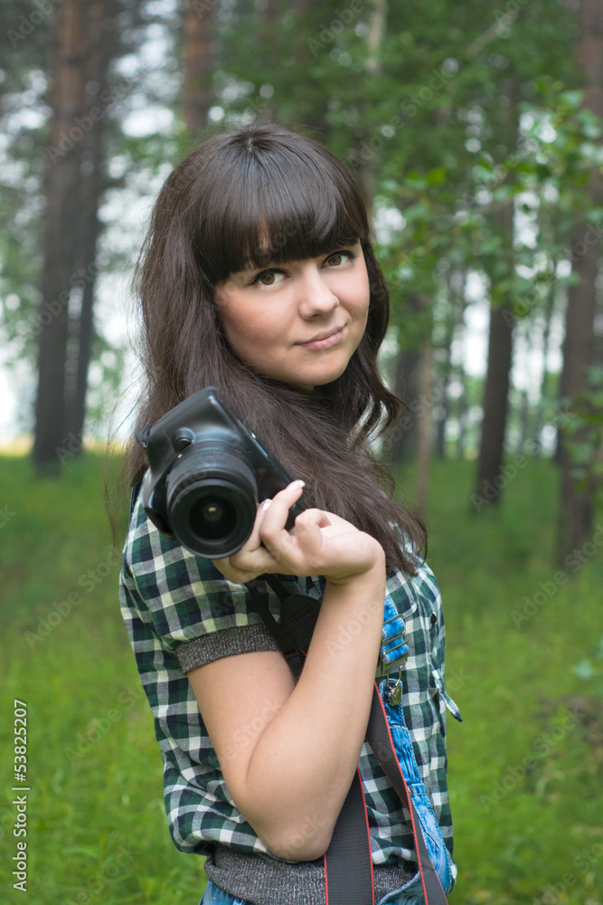 Portrait of pretty brunette taking pictures Portrait of pretty brunette taking pictures