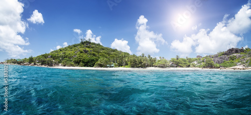 White coral sand on tropical beach. La Digue island  Seyshelles.