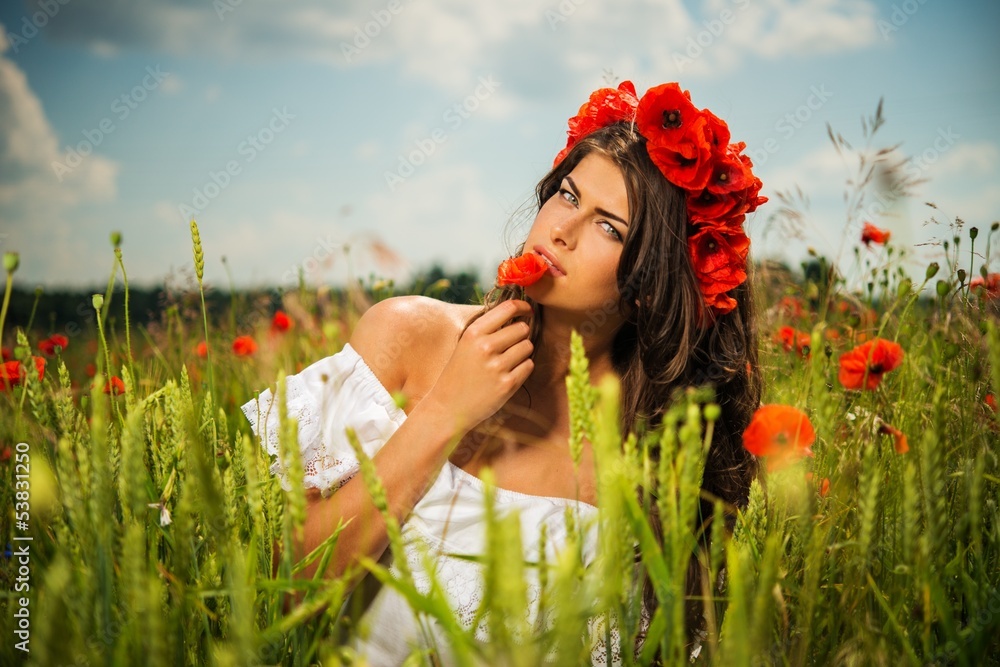 Beautiful young brunette girl in poppy filed Beautiful young brunette girl in poppy filed