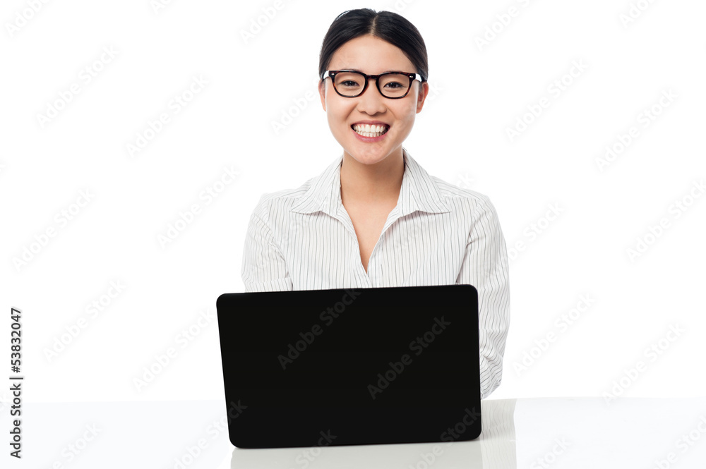 Smiling corporate lady with laptop Smiling corporate lady with laptop