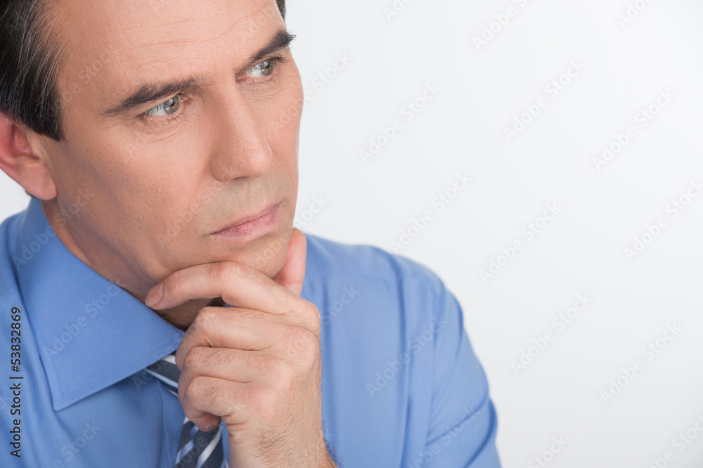 Birth of new business idea. Handsome mature businessman holding Birth of new business idea. Handsome mature businessman holding