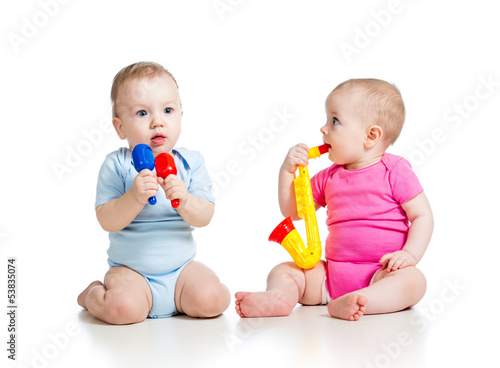 Babies girl and boy  playin...